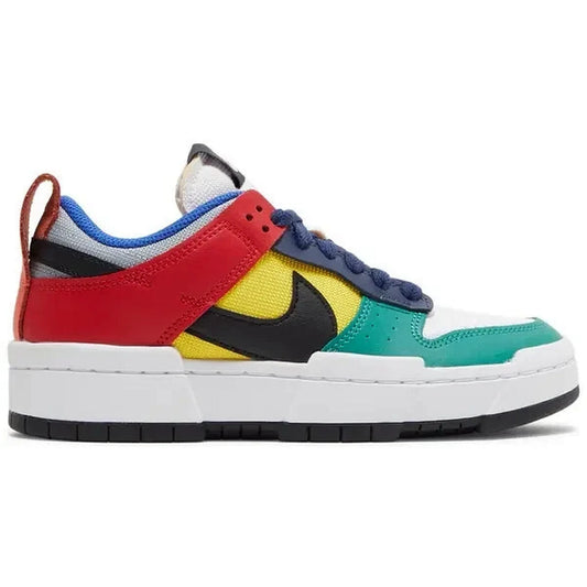 Nike Dunk Low Disrupt Multi-Color – Seitenansicht des bunten Damen-Sneakers mit gelbem Mittelteil, grüner Zehenpartie, rotem Fersenbereich und schwarzem Swoosh auf weißem Hintergrund